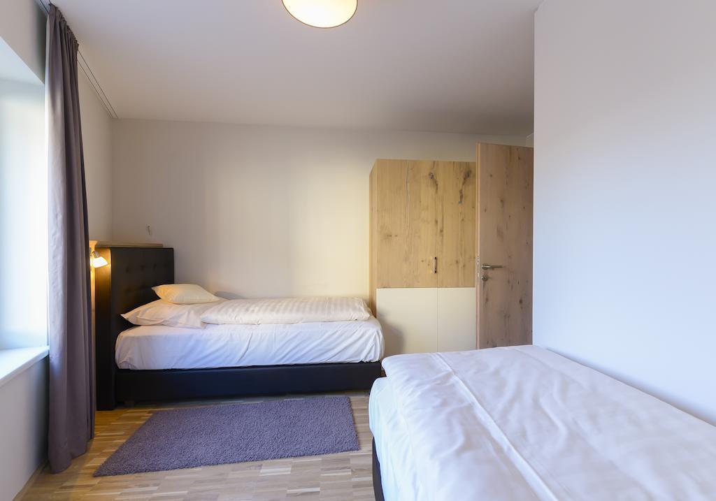Appartementhotel Sonnenhof Kössen Quarto foto