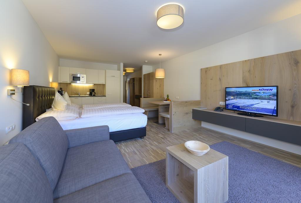 Appartementhotel Sonnenhof Kössen Quarto foto